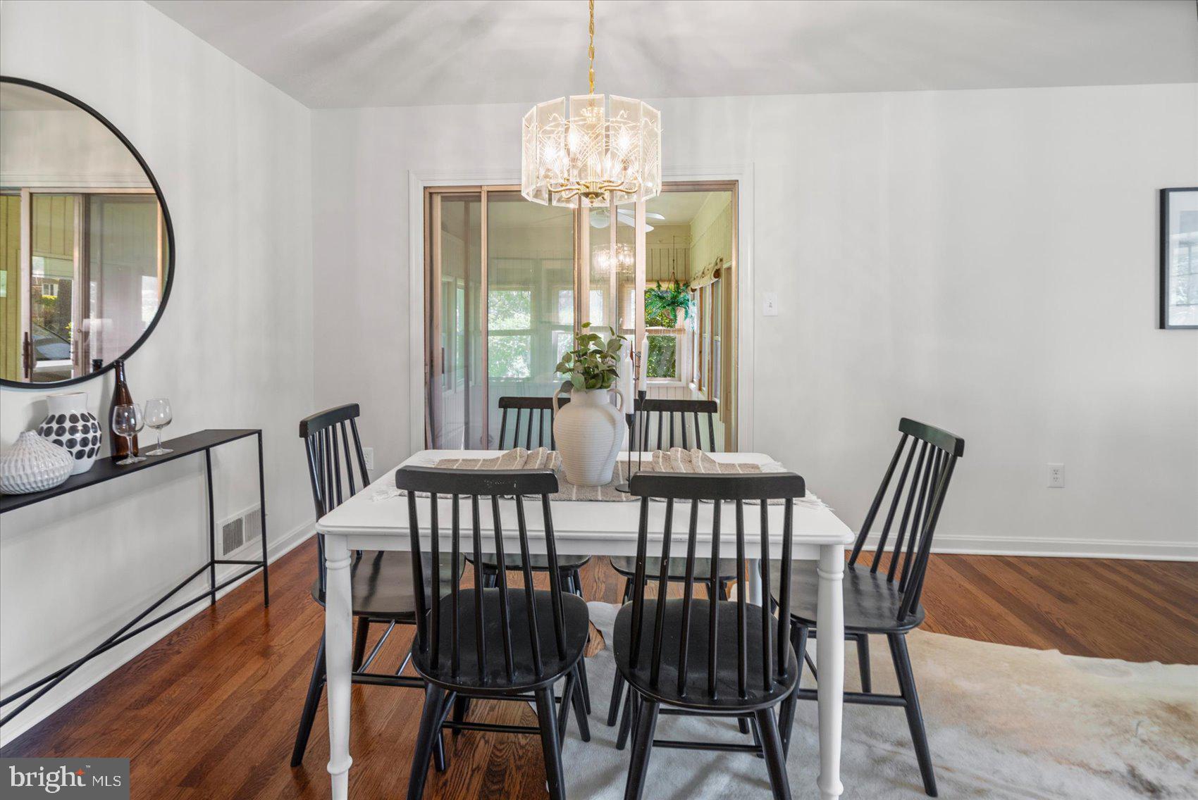 2300 Musgrove Road Silver Spring, MD 20904 - Photo 18 of 41 a view of a dining room with furniture and chandelier