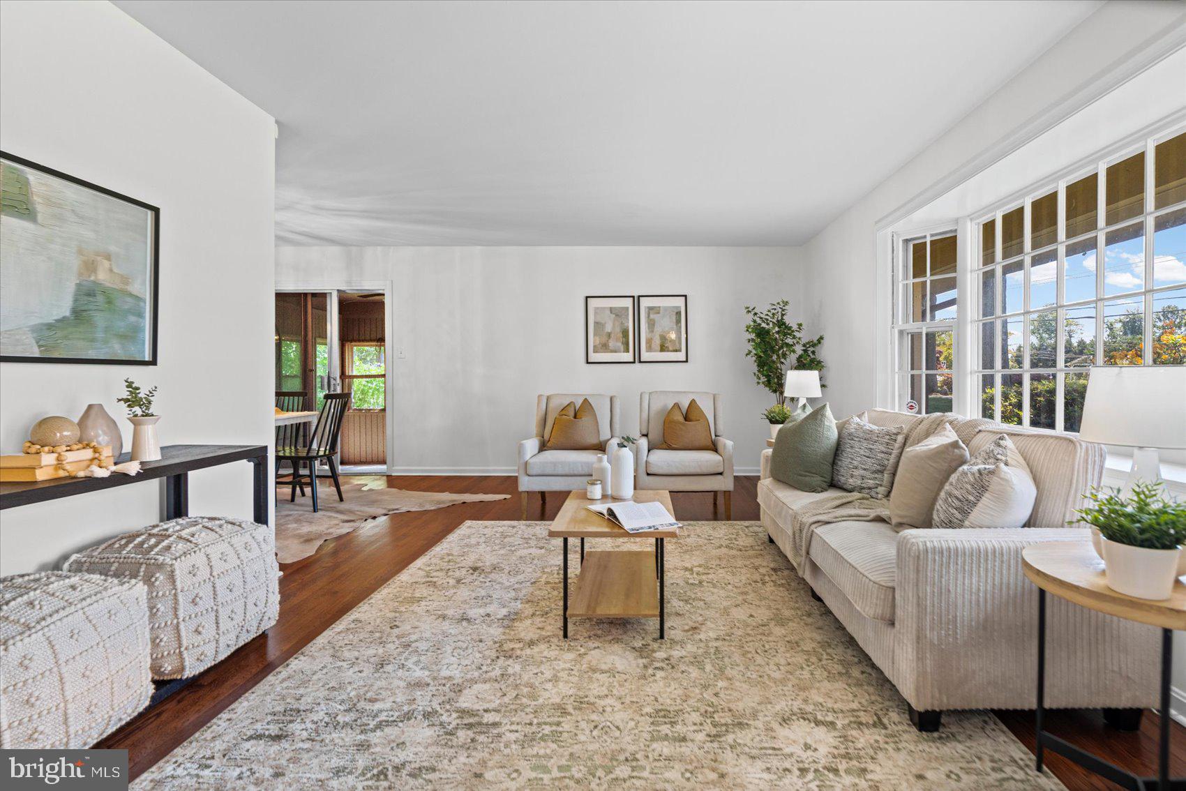 2300 Musgrove Road Silver Spring, MD 20904 - Photo 2 of 41 a living room with furniture wooden floor and a window