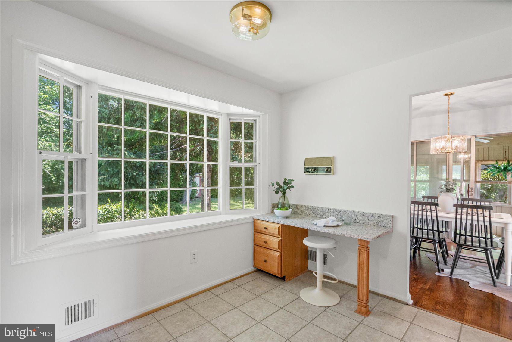 2300 Musgrove Road Silver Spring, MD 20904 - Photo 21 of 41 a room with a table and chairs