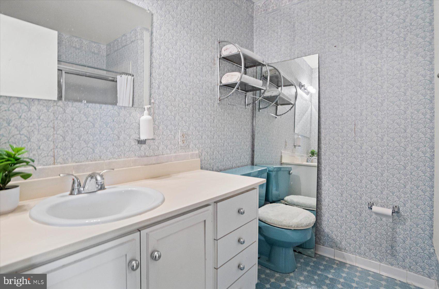 2300 Musgrove Road Silver Spring, MD 20904 - Photo 25 of 41 a bathroom with a sink toilet and shower