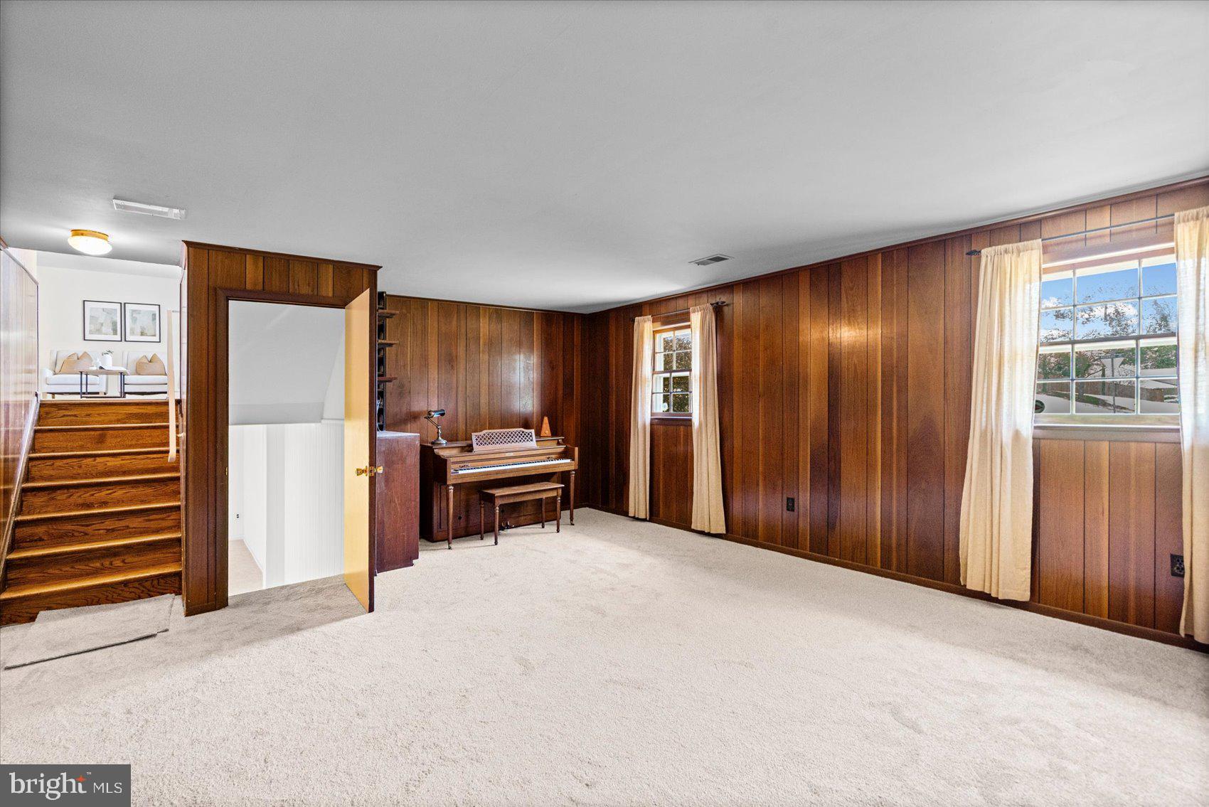 2300 Musgrove Road Silver Spring, MD 20904 - Photo 29 of 41 a view of a livingroom with furniture and staircase