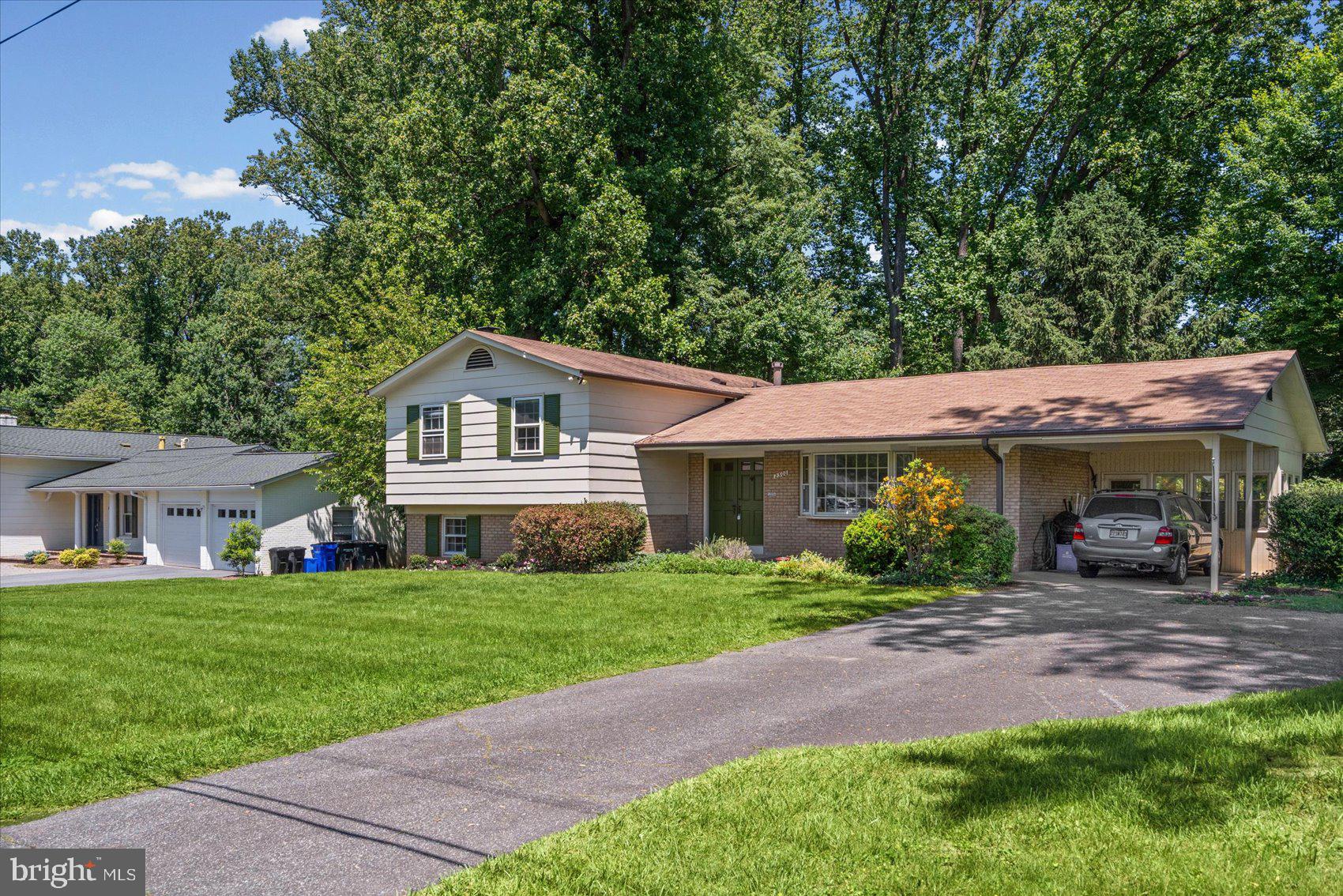 2300 Musgrove Road Silver Spring, MD 20904 - Photo 39 of 41 a front view of a house with a yard