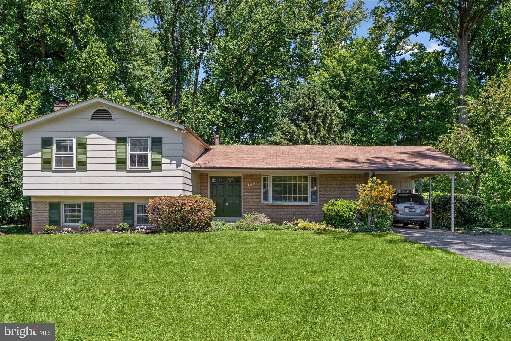 2300 Musgrove Road Silver Spring, MD 20904 - Photo 40 of 41 a front view of house with yard and green space
