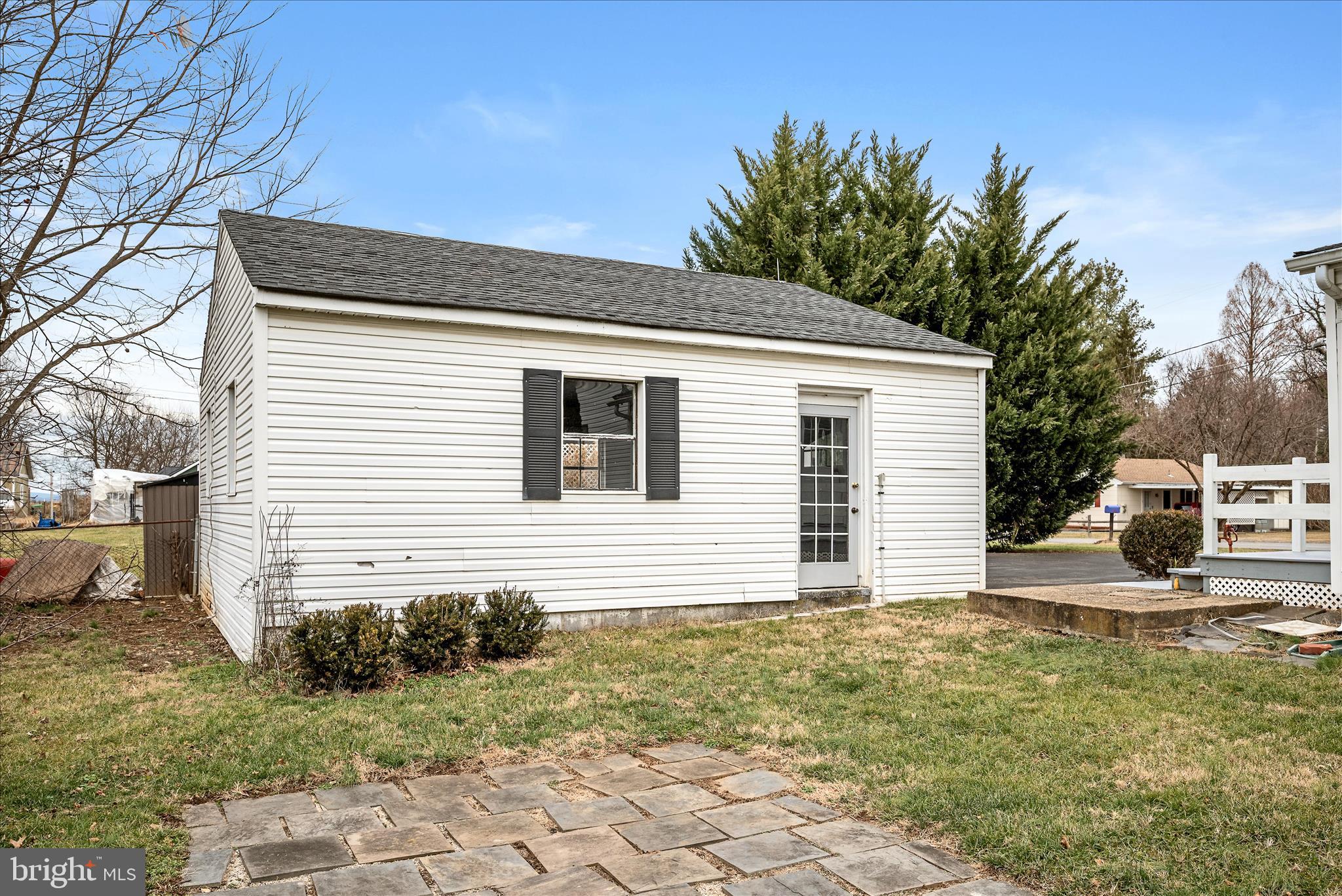 129 Church Street Summit Point, WV 25446 - Photo 15 of 81 a view of a house with a yard