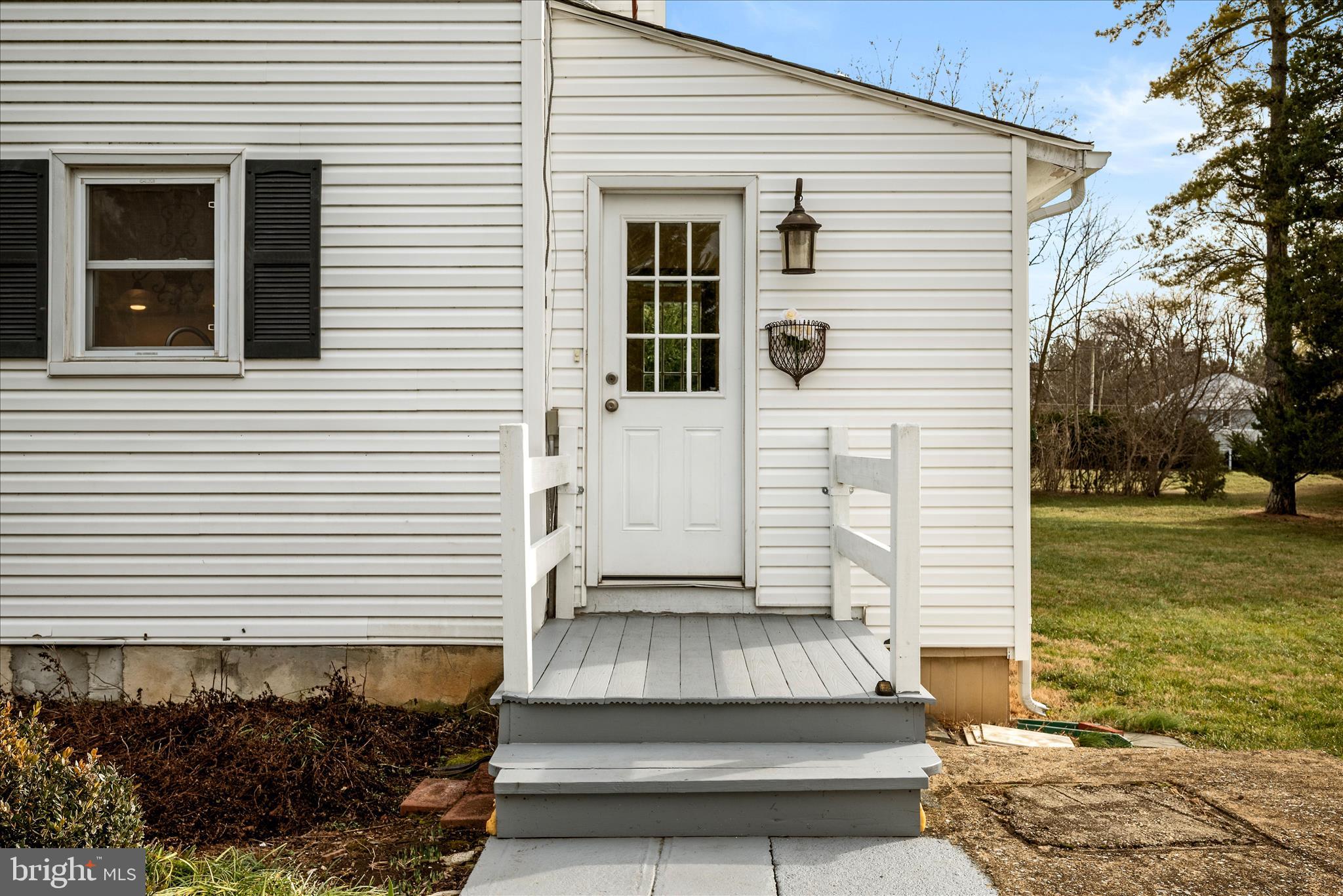 129 Church Street Summit Point, WV 25446 - Photo 20 of 91 a front view of a house with a yard
