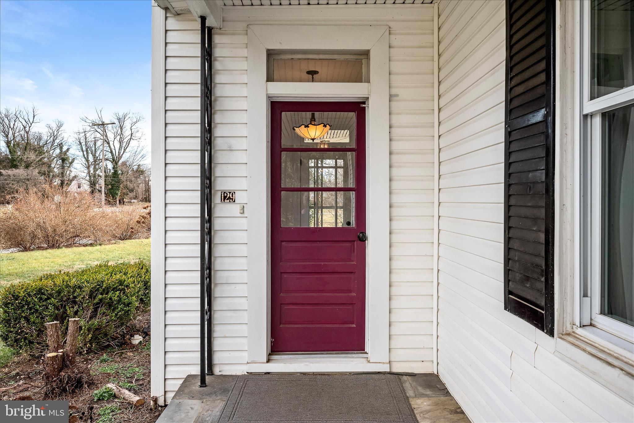 129 Church Street Summit Point, WV 25446 - Photo 22 of 81 a front view of a house with a yard