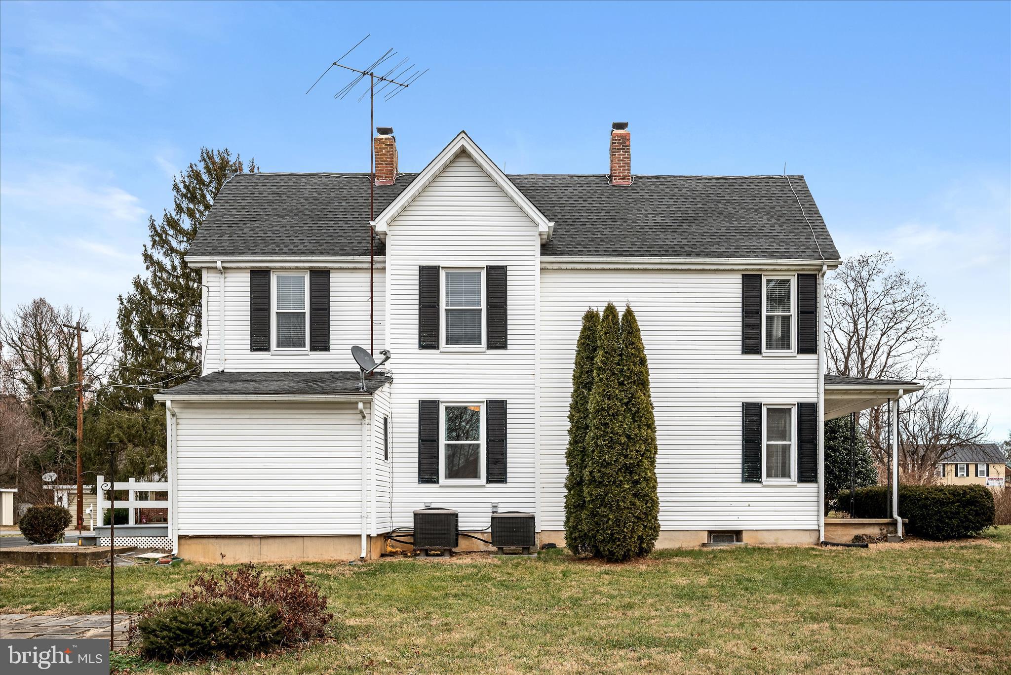 129 Church Street Summit Point, WV 25446 - Photo 5 of 81 a front view of a house with a yard