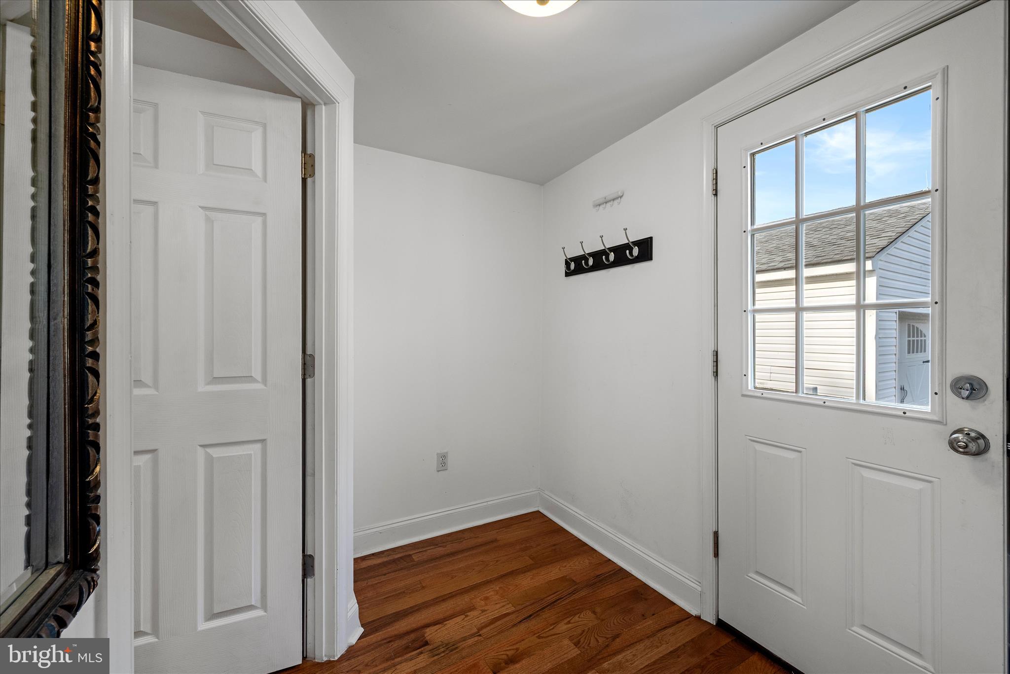 129 Church Street Summit Point, WV 25446 - Photo 50 of 91 a view of empty room with wooden floor and fan