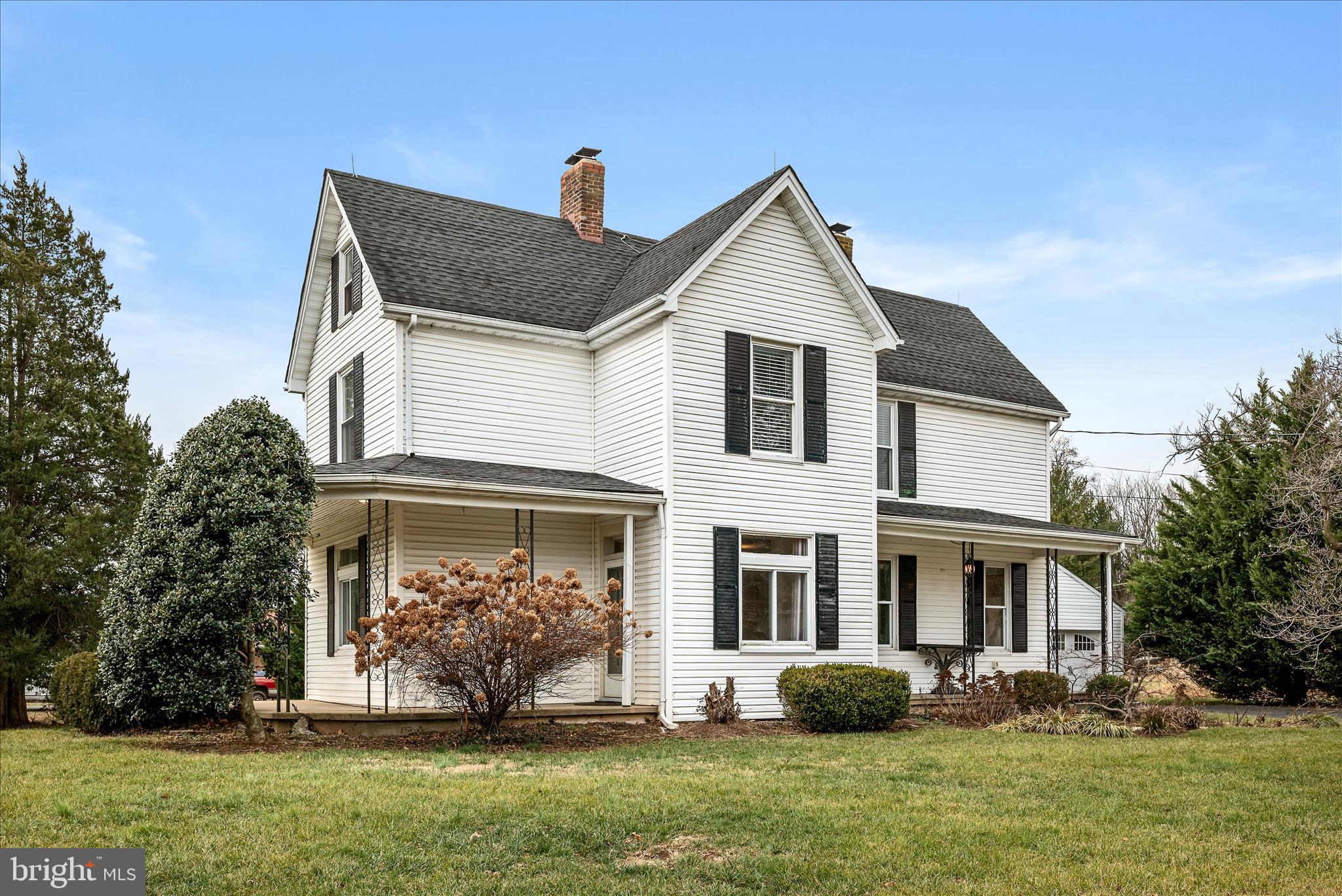 129 Church Street Summit Point, WV 25446 - Photo 6 of 91 a front view of a house with a yard