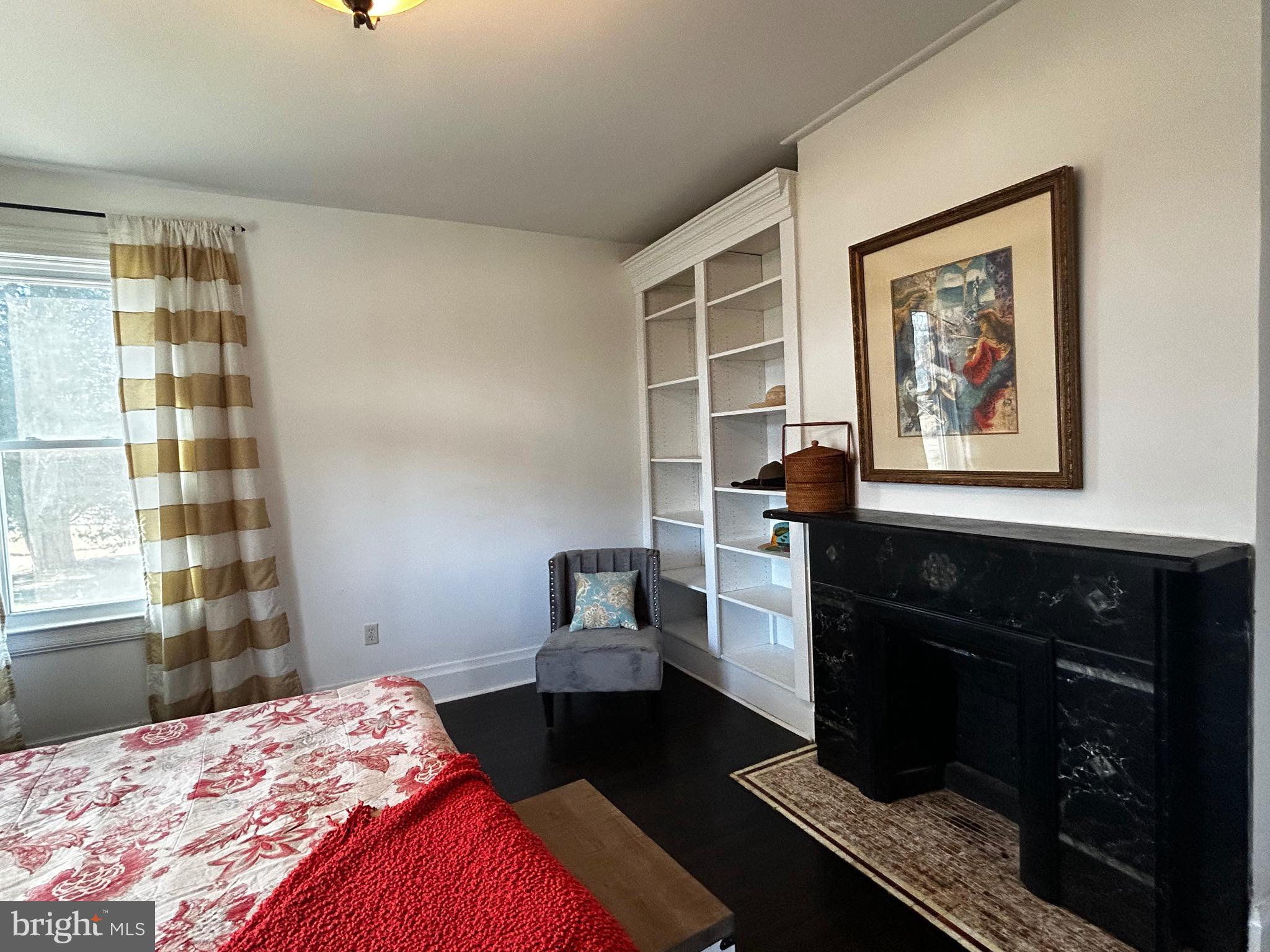 129 Church Street Summit Point, WV 25446 - Photo 59 of 91 a bedroom with a bed and a window