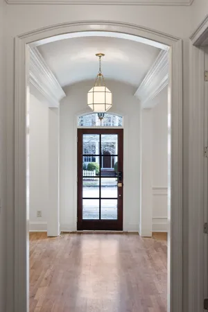 an empty room that has a window in it