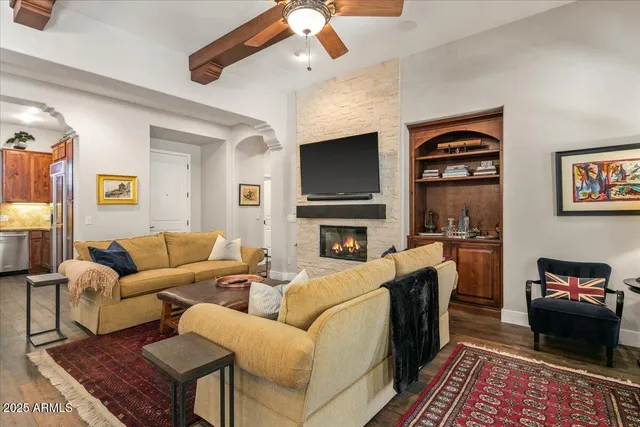 a kitchen with granite countertop stainless steel appliances a stove sink and microwave