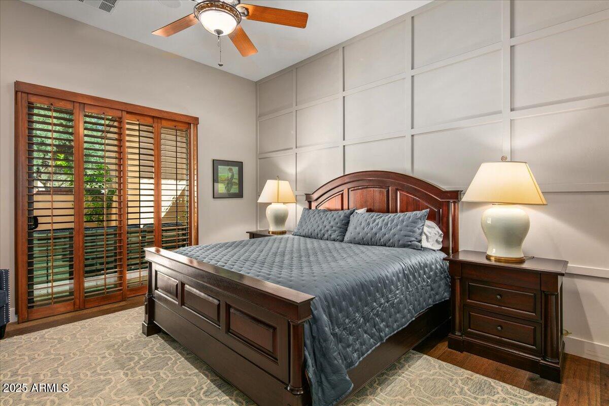 20704 North 90th Place, Unit 1004 Scottsdale, AZ 85255 - Photo 16 of 28 a bedroom with a bed and window