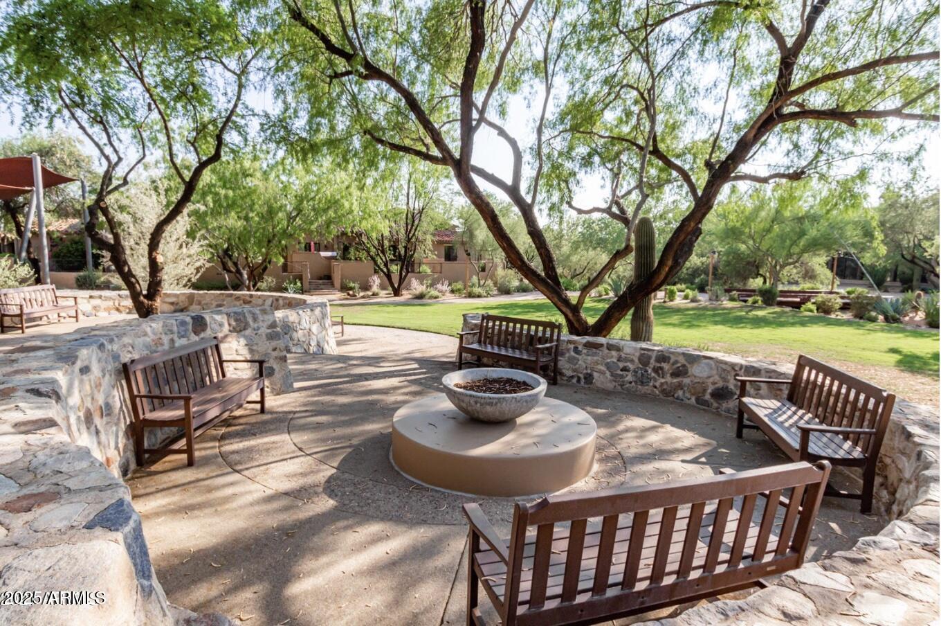 20704 North 90th Place, Unit 1004 Scottsdale, AZ 85255 - Photo 25 of 28 a view of a patio with a yard
