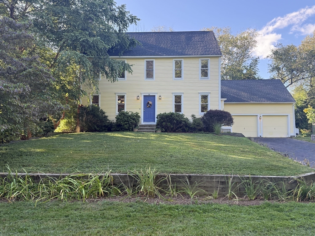 291 Harvard Road Bolton, MA 01740 - Photo 29 of 40 a view of a house with a yard