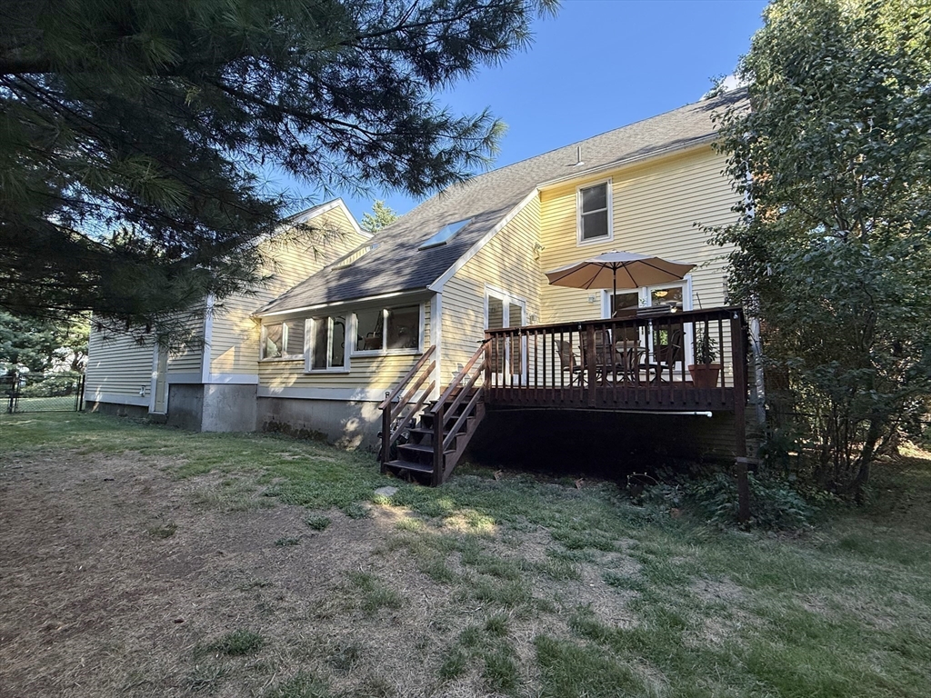 291 Harvard Road Bolton, MA 01740 - Photo 33 of 40 a view of a house with a yard