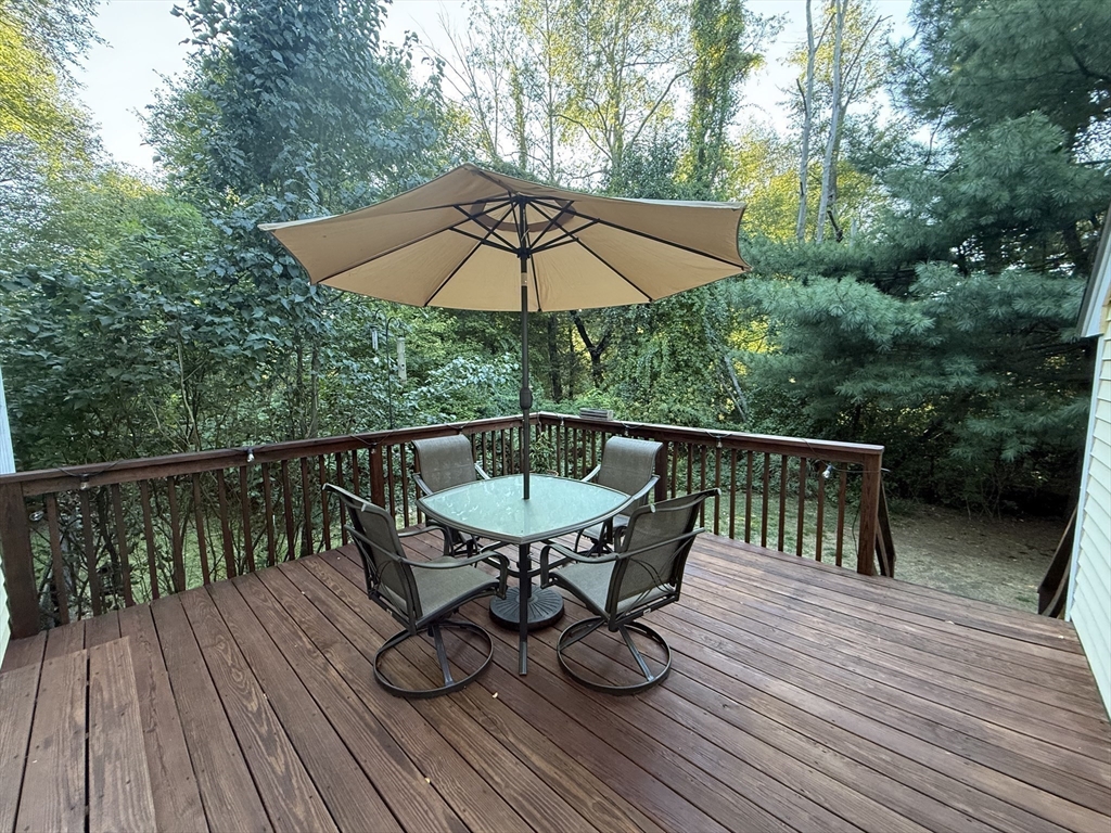 291 Harvard Road Bolton, MA 01740 - Photo 34 of 40 a view of balcony with furniture and wooden deck