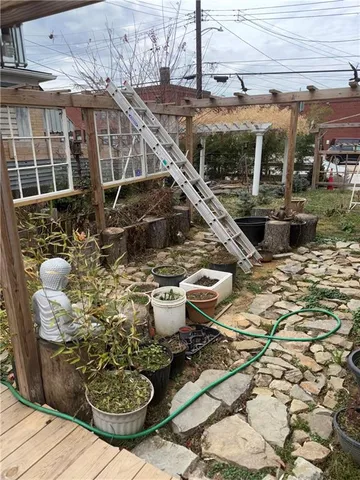 a view of swimming pool with outdoor seating