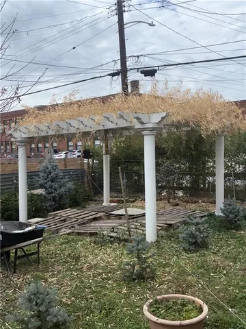 a view of a chairs and table in the patio