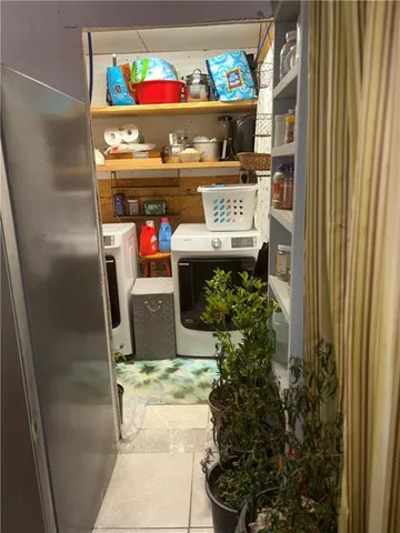 a utility room with washer and dryer