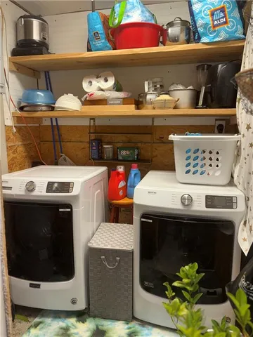 a utility room with washer and dryer