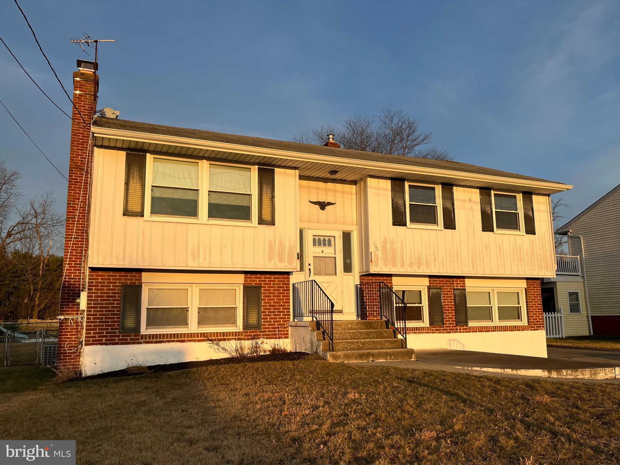 1109 Ladner Avenue Gibbstown, NJ 08027 - Photo 1 of 34 a view of a house with a yard