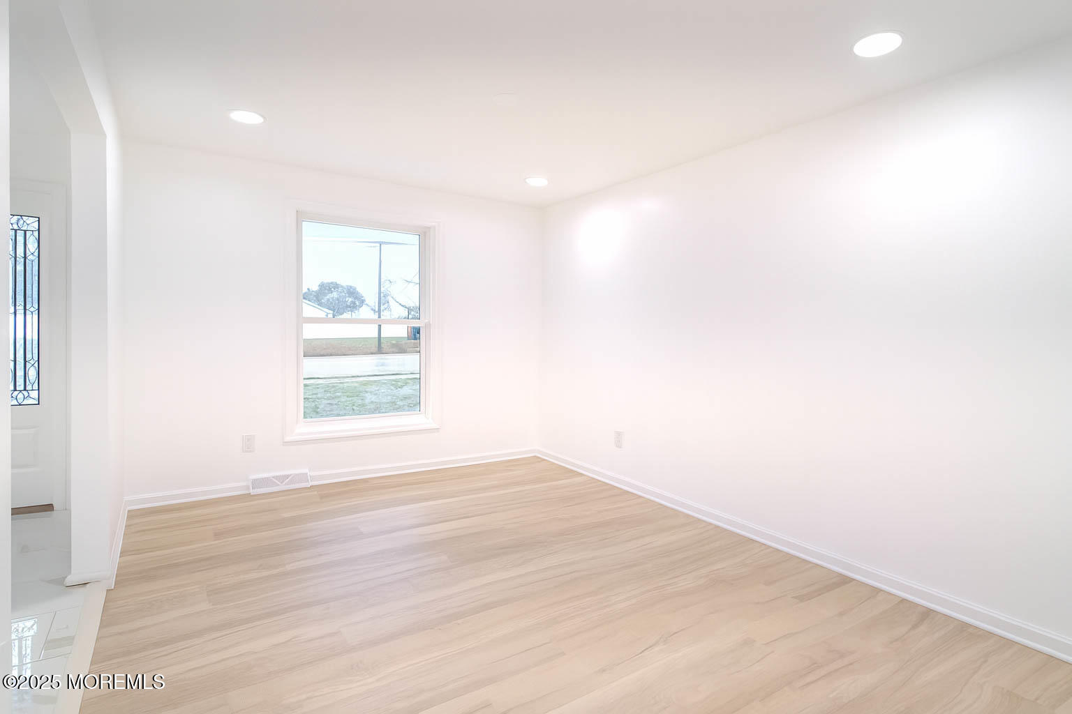 125 Shore Road Marmora, NJ 08223 - Photo 11 of 26 a view of empty room with wooden floor and fan