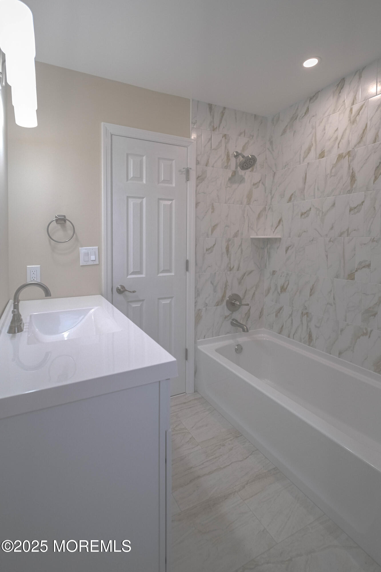 125 Shore Road Marmora, NJ 08223 - Photo 23 of 26 a bathroom with a bathtub and a sink