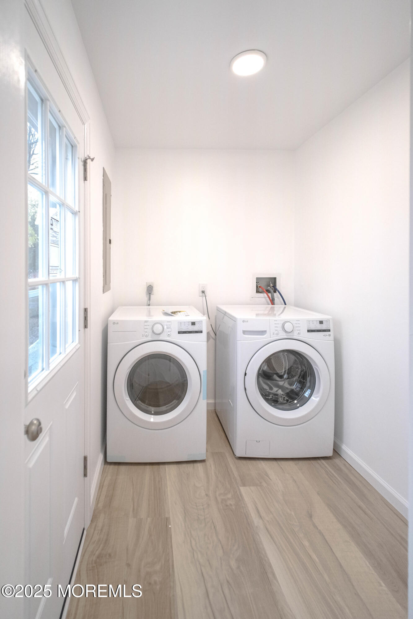 125 Shore Road Marmora, NJ 08223 - Photo 25 of 26 a utility room with dryer and washer