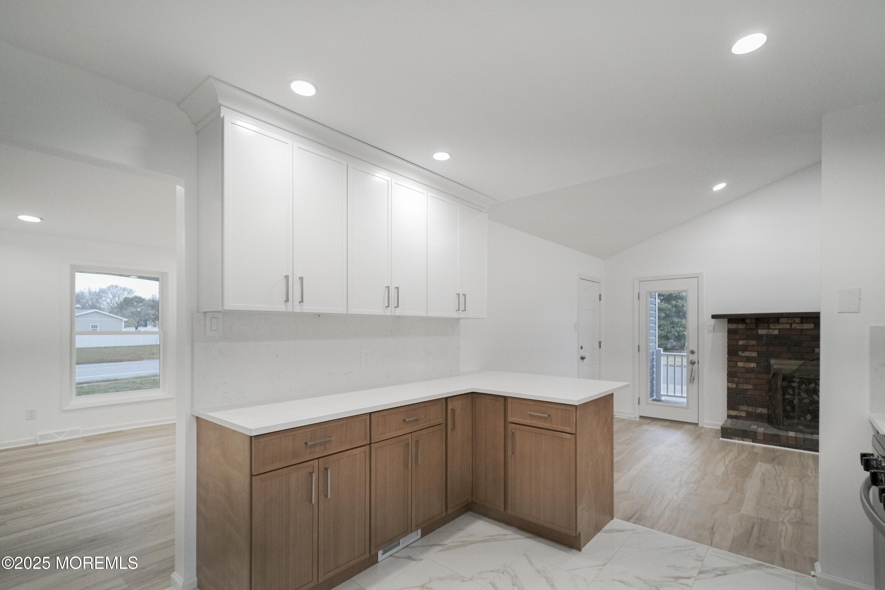 125 Shore Road Marmora, NJ 08223 - Photo 9 of 26 a kitchen with cabinets and window