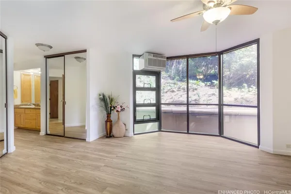 a view of an empty room with a window
