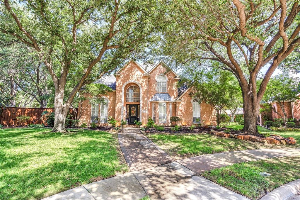 4560 Emerson Drive Plano, TX 75093 - Photo 1 of 1 a front view of a house with a yard
