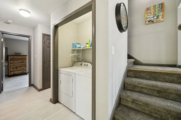 a utility room with dryer and washer
