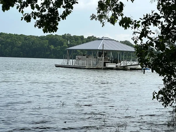 a view of a lake with a yard