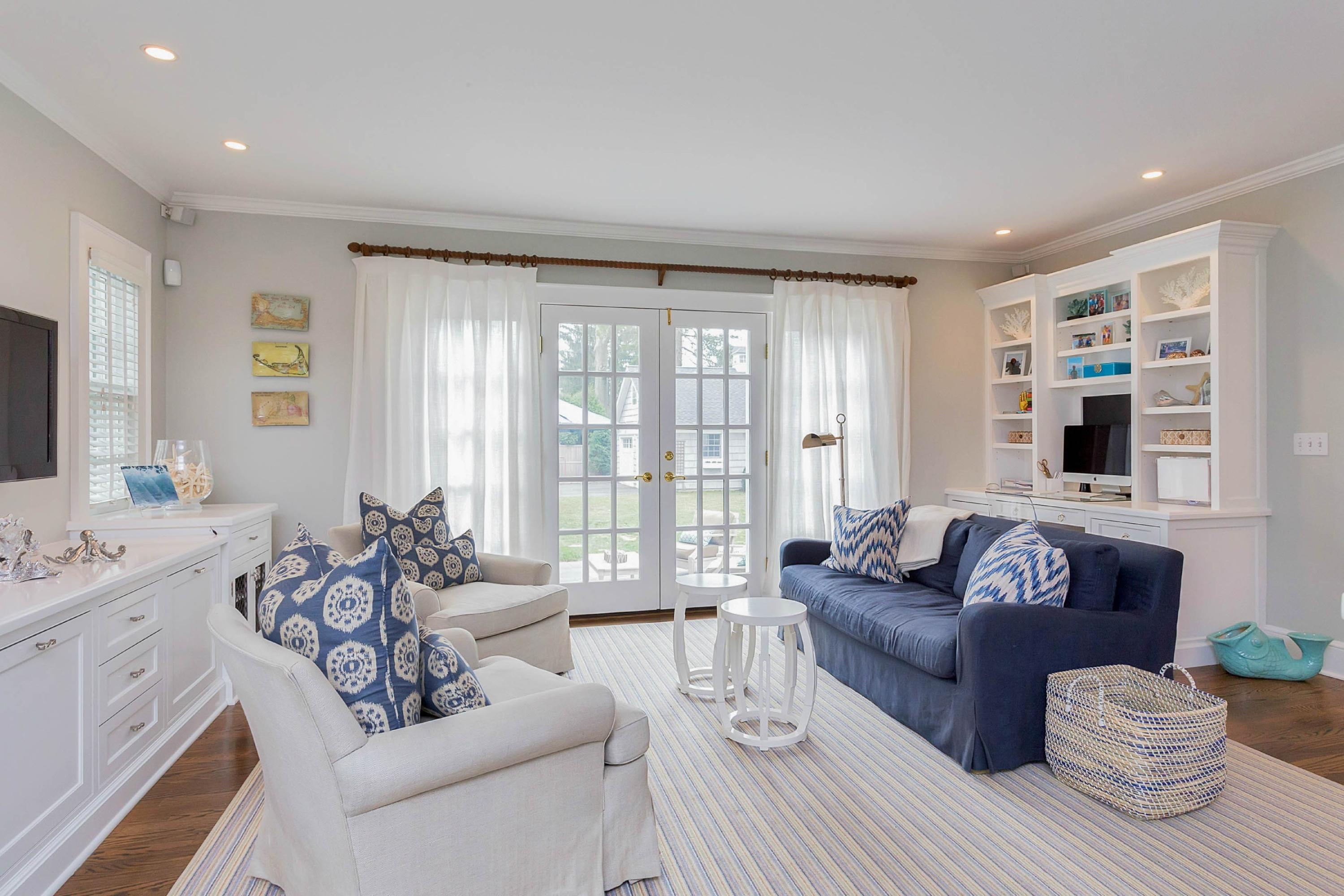 6 Sunset Road Darien, CT 06820 - Photo 11 of 24 a living room with furniture and a large window