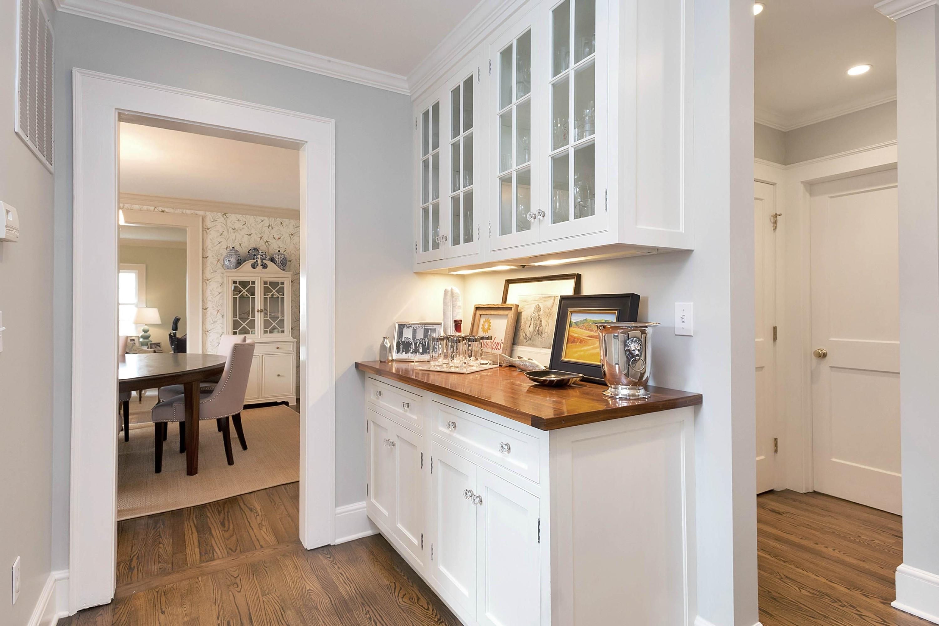6 Sunset Road Darien, CT 06820 - Photo 14 of 24 a kitchen with cabinets and wooden floor