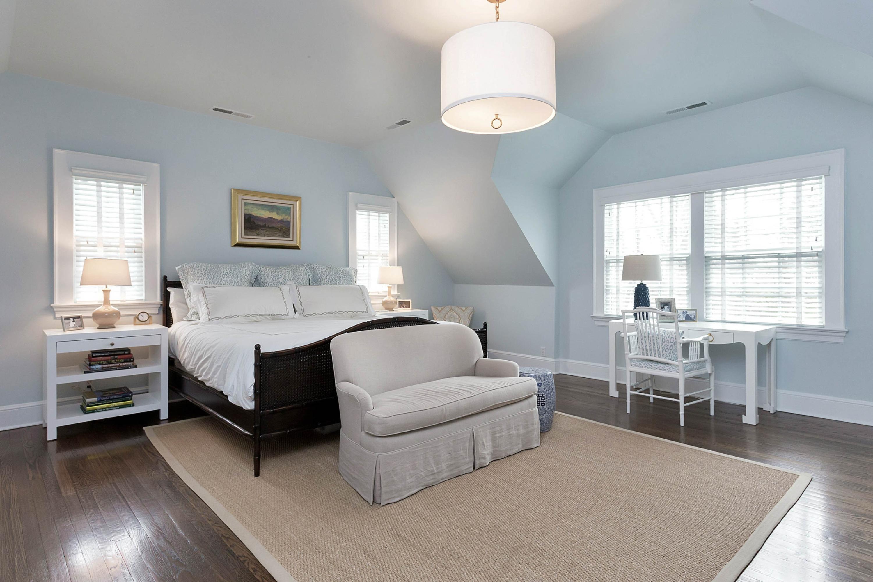 6 Sunset Road Darien, CT 06820 - Photo 17 of 24 a spacious bedroom with a bed and a table chair