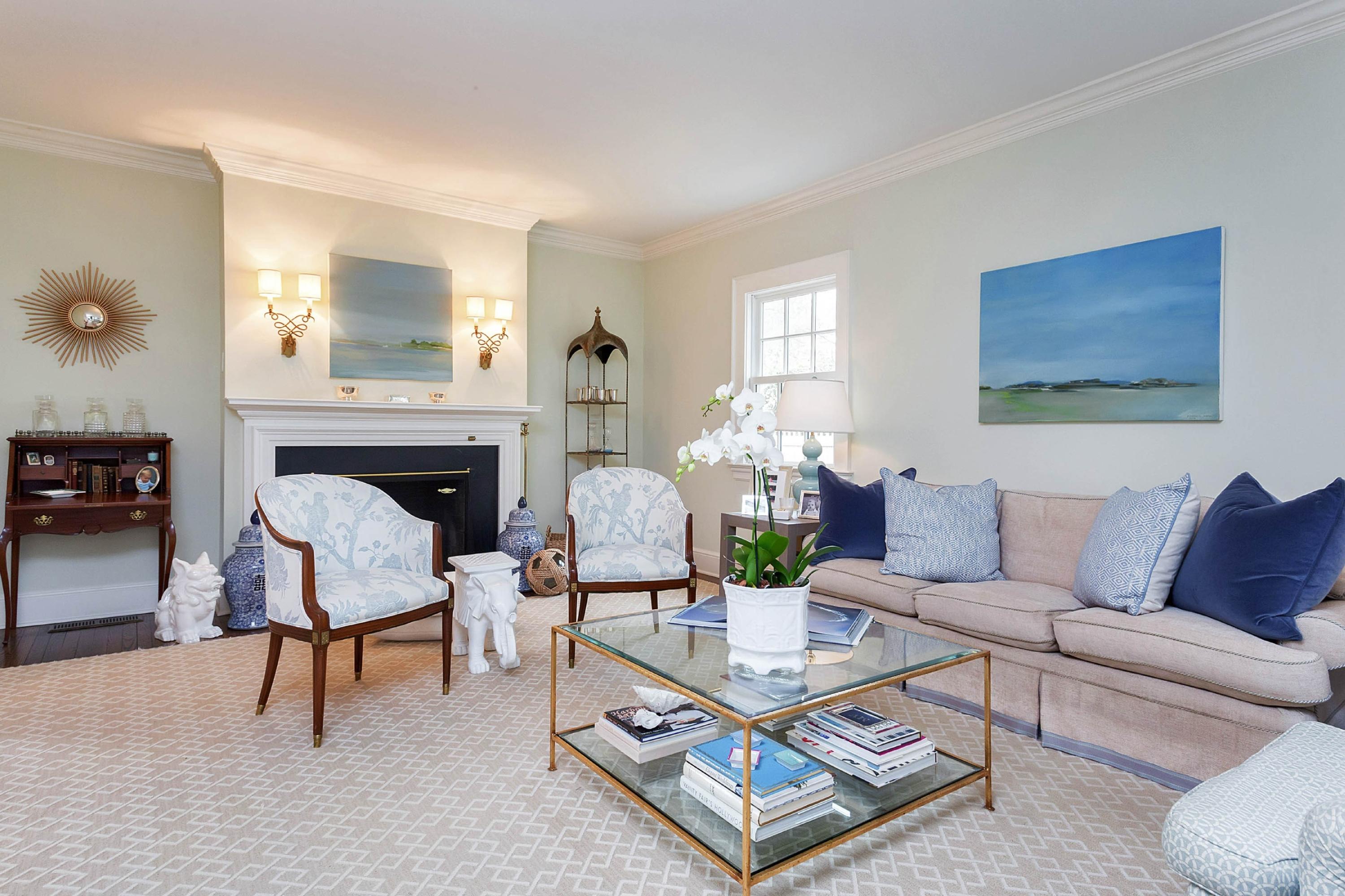 6 Sunset Road Darien, CT 06820 - Photo 3 of 24 a living room with furniture and a fireplace