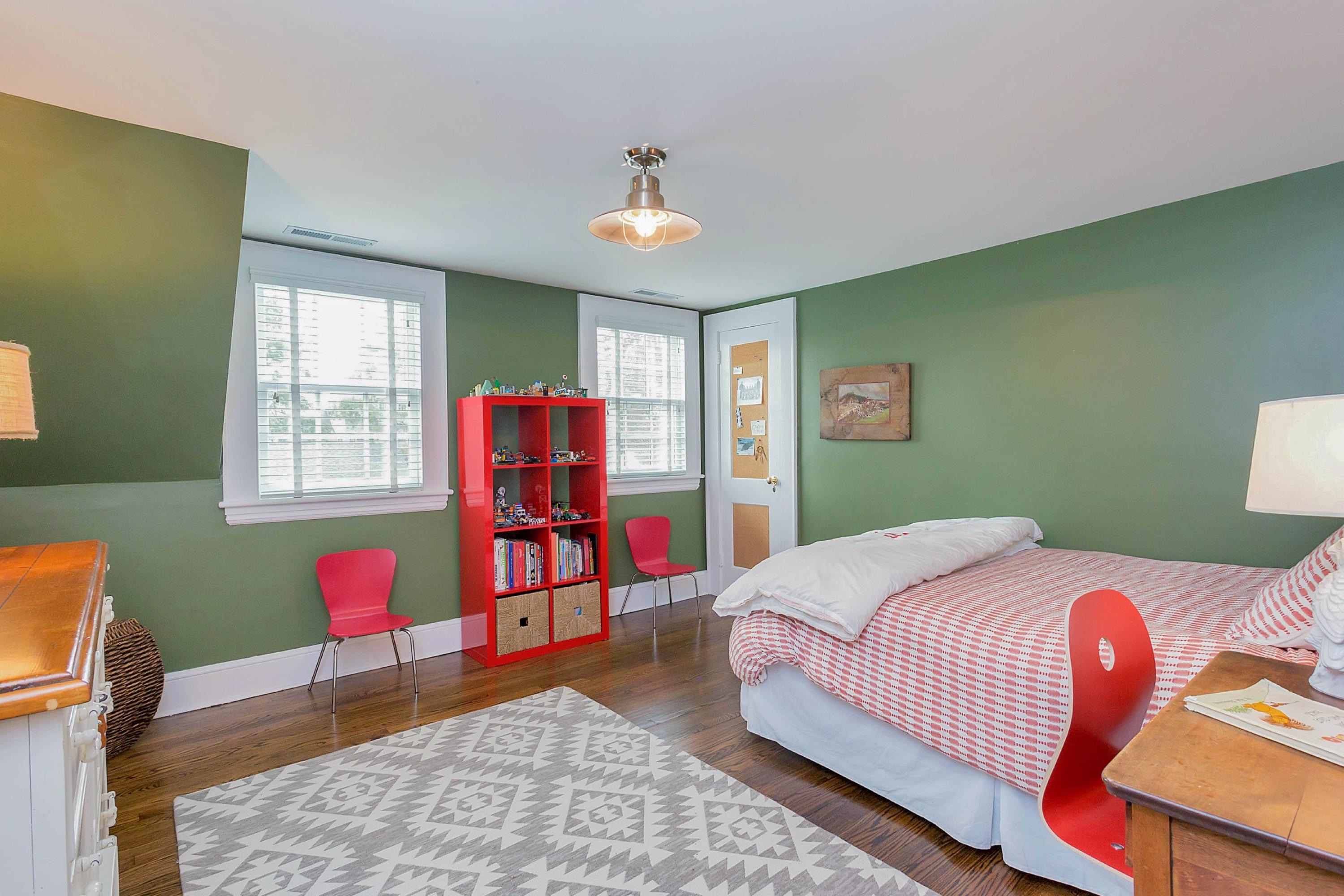 6 Sunset Road Darien, CT 06820 - Photo 21 of 24 a bedroom with a bed closet and a window