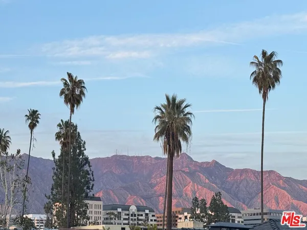a view of a city with a ocean view