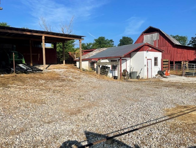 5210 Ditty Road Cookeville, TN 38506 - Photo 12 of 17 a view of a house with a yard and porch