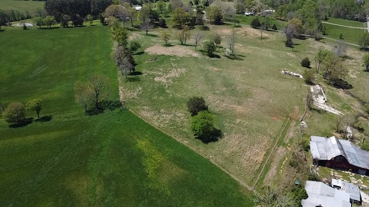 5210 Ditty Road Cookeville, TN 38506 - Photo 2 of 17 a backyard of a house with a yard and outdoor seating