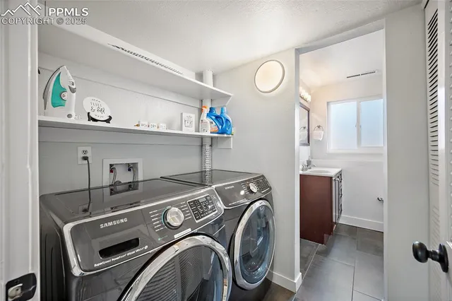 a utility room with dryer and washer