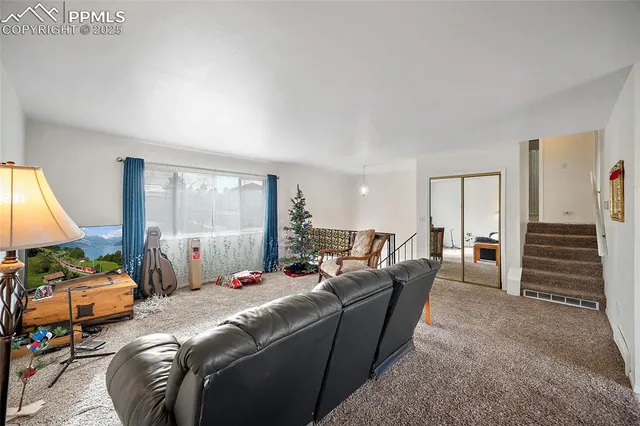 a room with furniture and a window