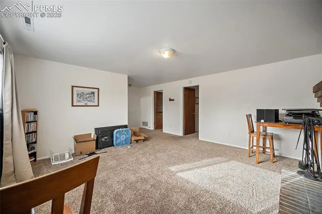 a bedroom with furniture and a bed