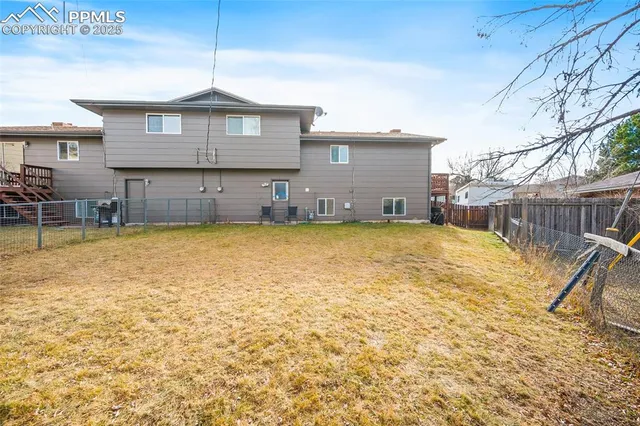 a view of a house with swimming pool