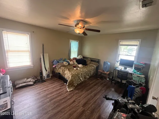 a bedroom with bed room and window