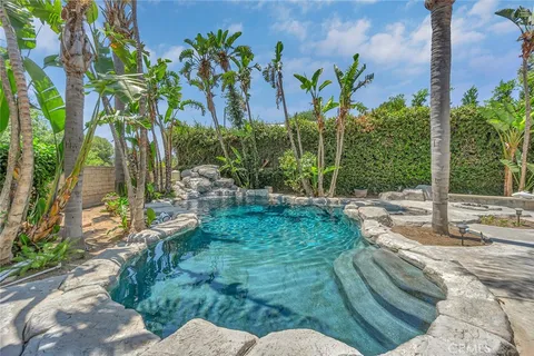 a backyard of a house with lots of green space