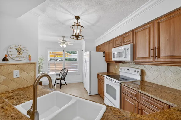 $309,000 | 3401 Southeast Martinique Trace, Unit 102, Stuart, FL 34997