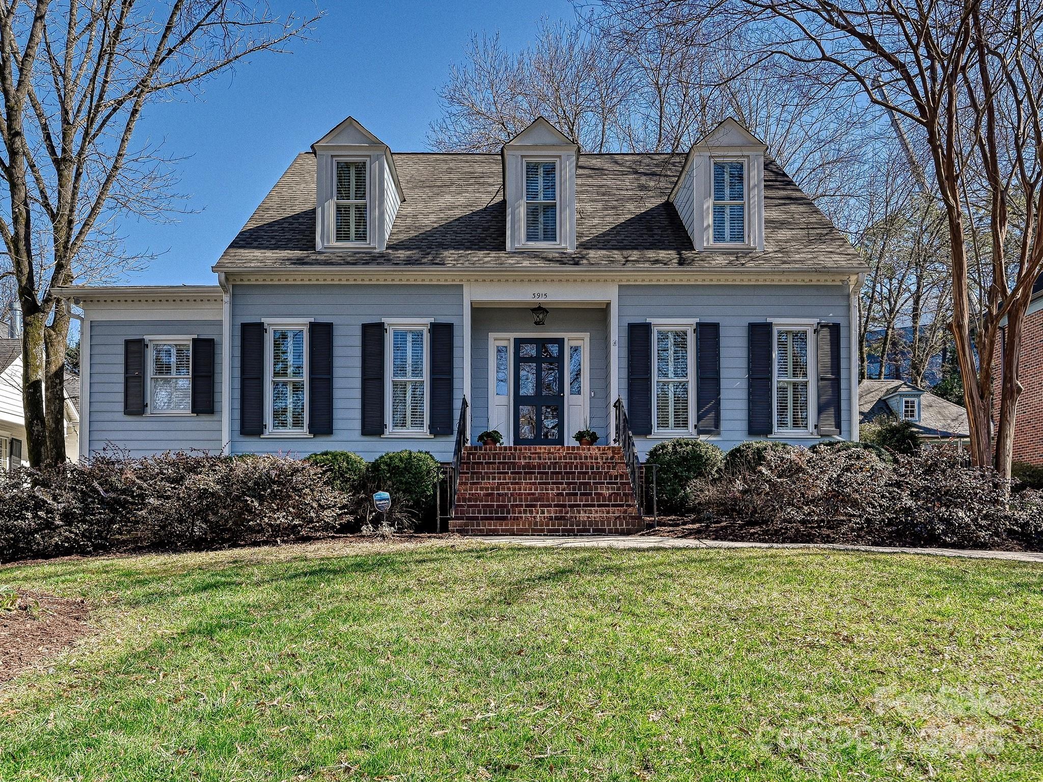 3915 Ayscough Road Charlotte, NC 28211 - Photo 1 of 45 a front view of a house with garden
